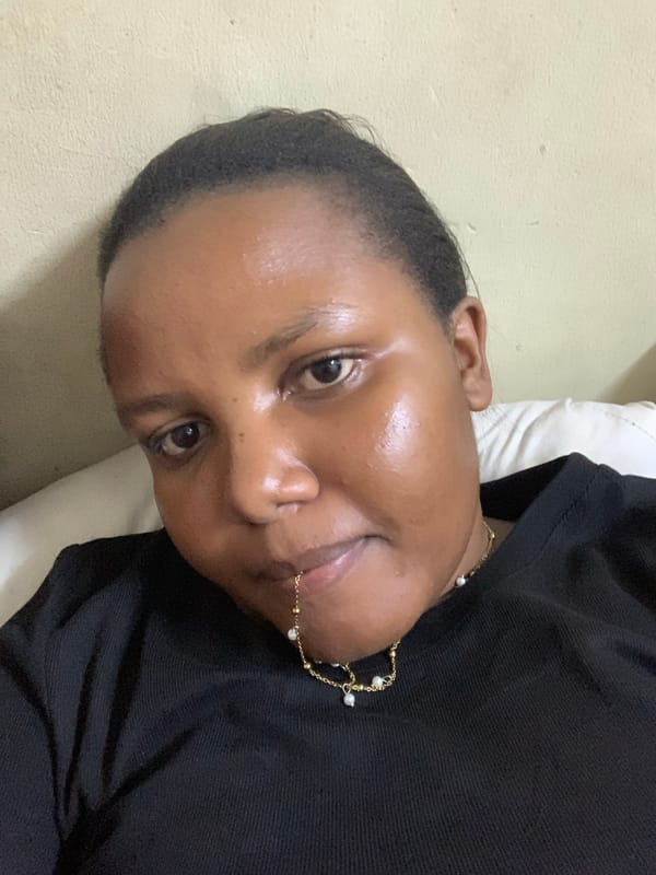 Woman photographed in casual indoor moments in Dar es Salaam