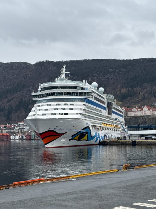 Cruise ship with eye design docked in Bergen