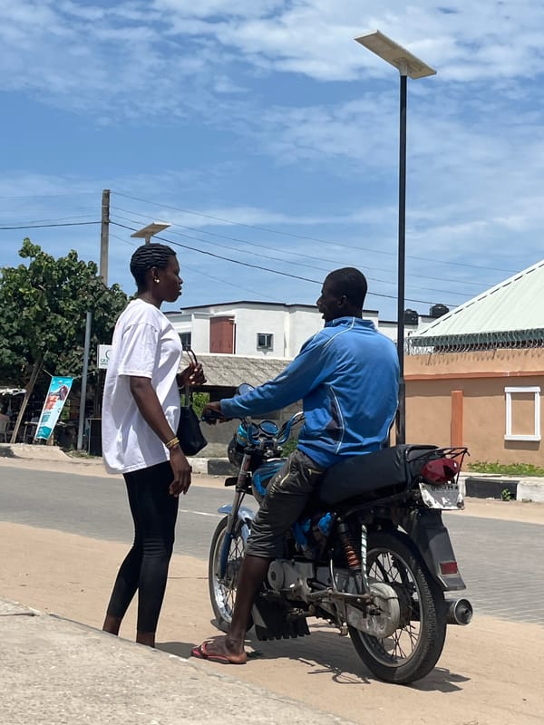 Motorcycle pickup captured on Badagry street