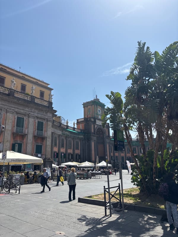 Daytime scene captured at Naples' Piazza San Domenico Maggiore