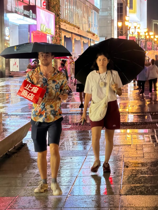 Rainy night life on the streets of Yuzhong District
