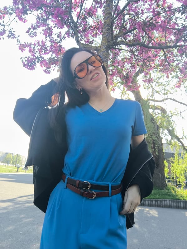 Woman poses for photos amid spring blooms in Riga