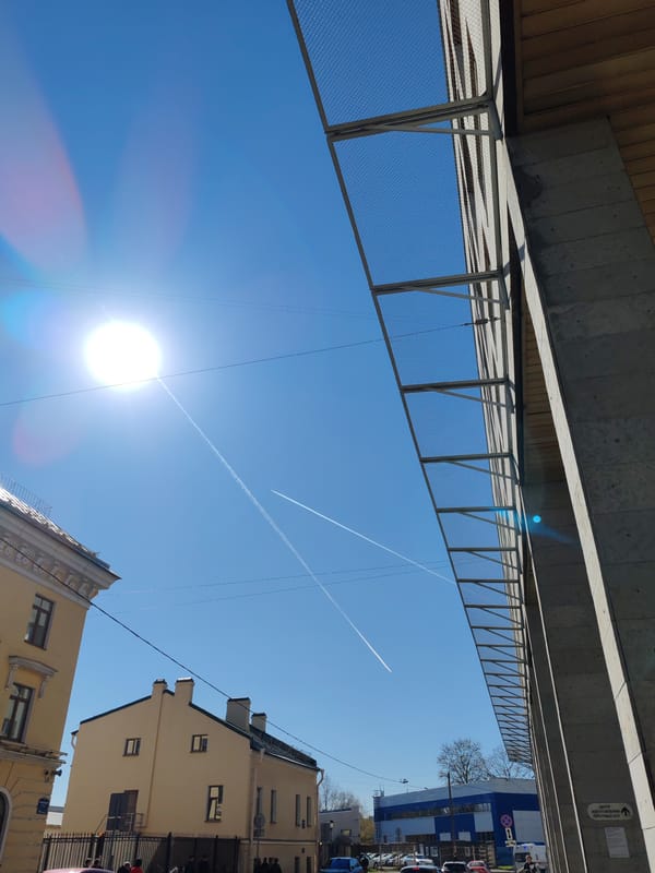 Everyday street scenes documented across Saint Petersburg during midday