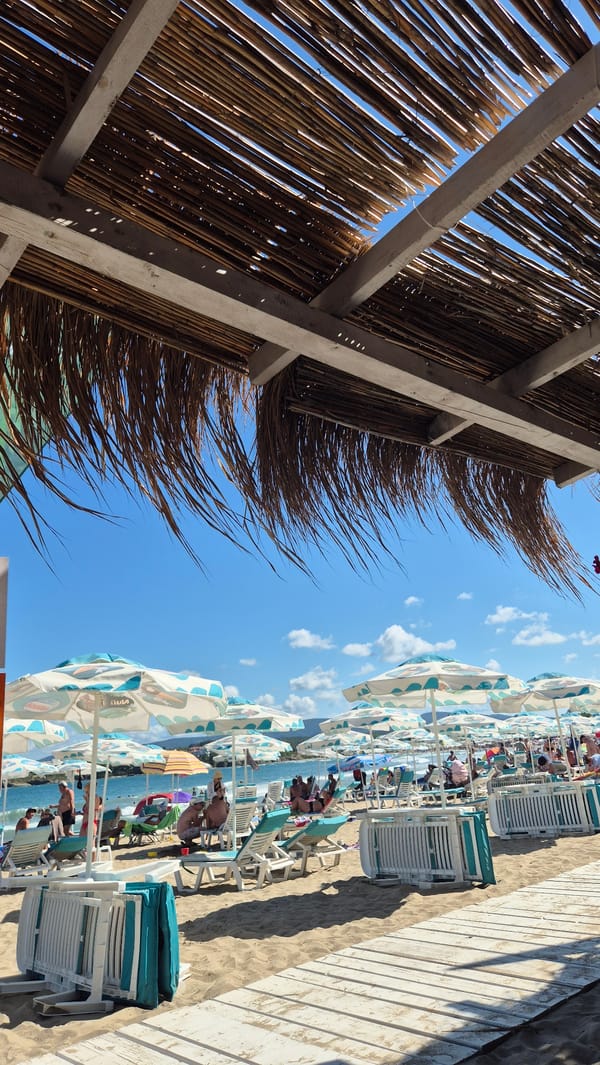 Beach bars and boardwalks on a summer day in Kiten