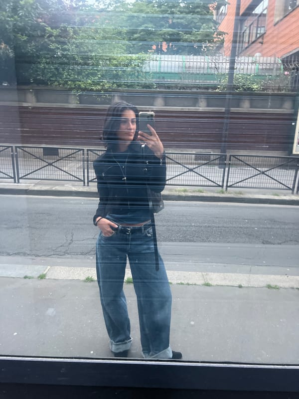 Person takes selfie on Paris street