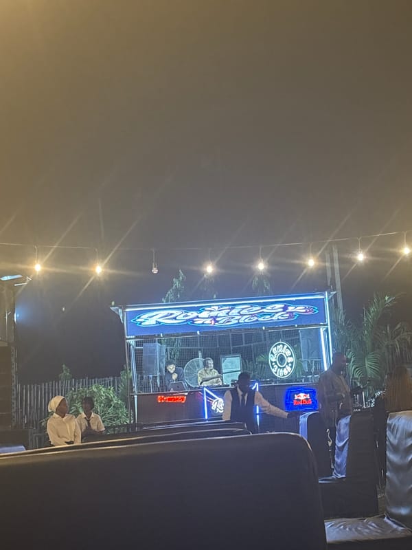 Nighttime social gathering documented at Lee's Bistro in Abuja