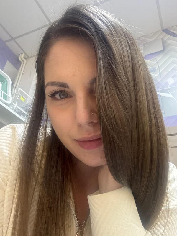 Woman documents shopping trip with selfies in Klin store