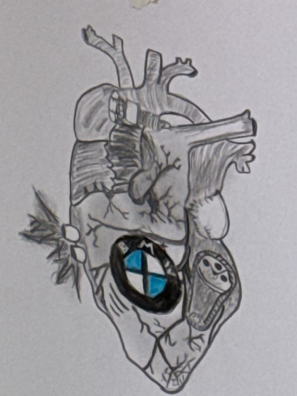Artist sketches anatomical drawings while wearing designer eyeglasses in Lüneburg
