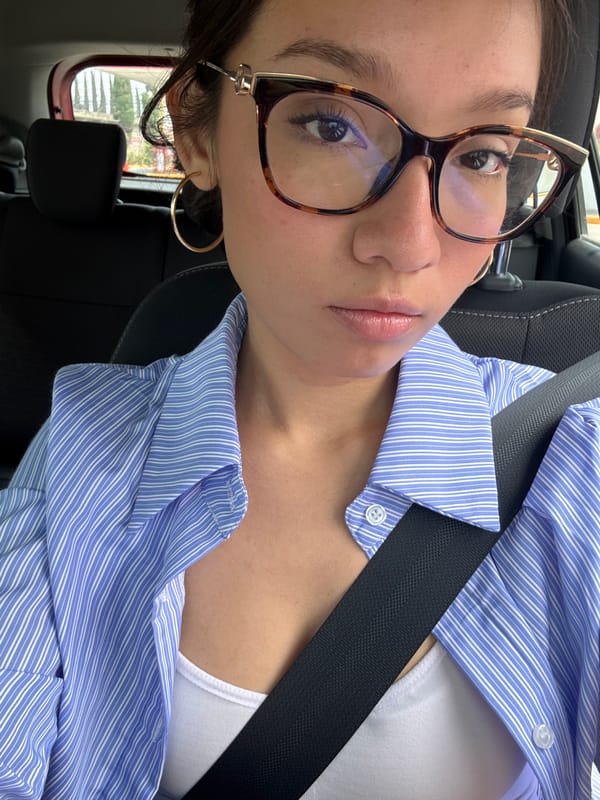 Woman in striped shirt observed in vehicle in Puebla