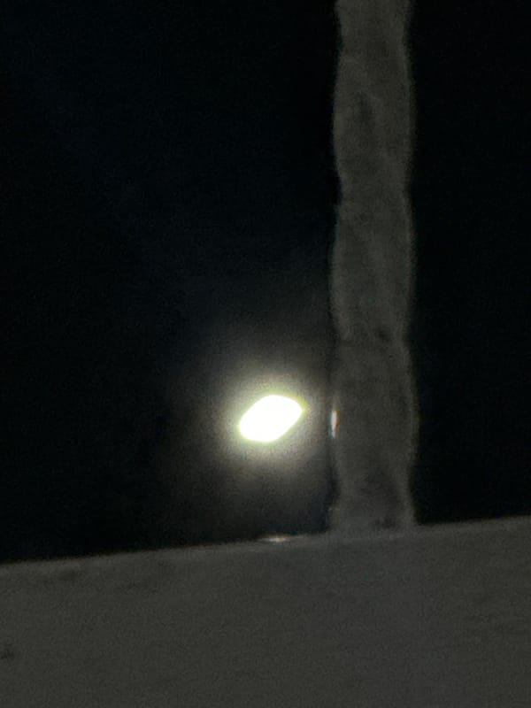 Nighttime street scenes and text graphics documented in El Maco