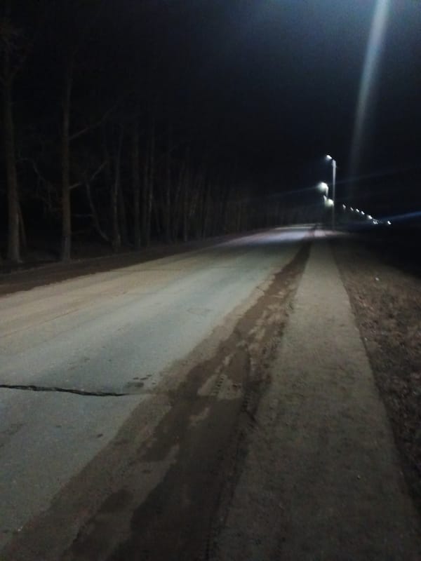 Nighttime documentation of Rusalevka streets and Soviet tractor monument