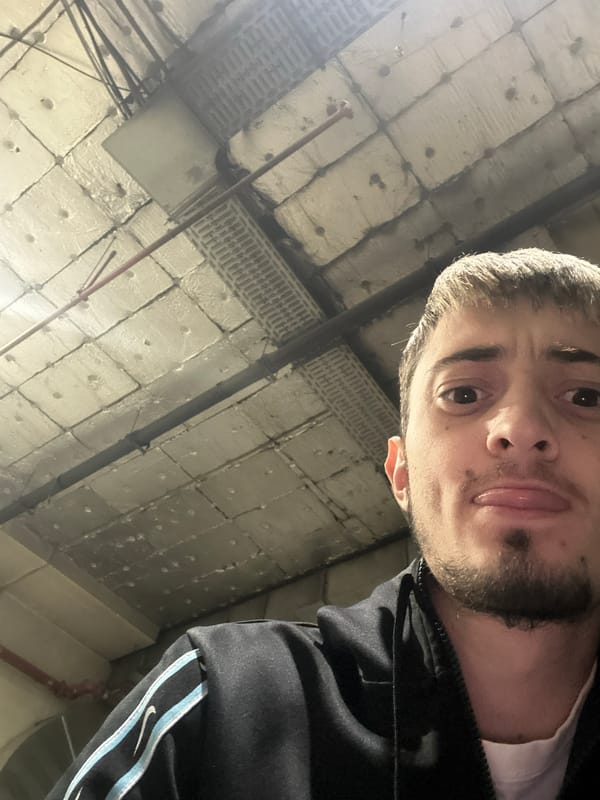 Man takes selfie in industrial indoor space in Bulgaria