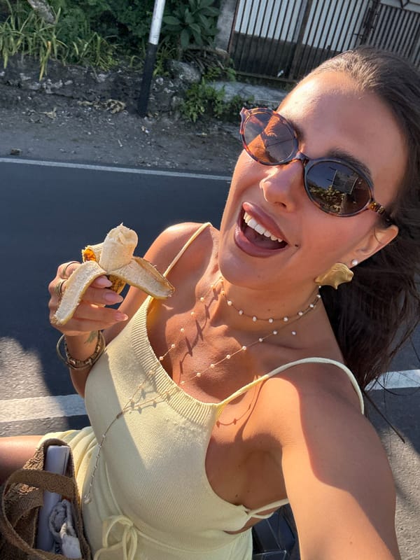 Woman Takes Banana Selfies in Kuta Selatan