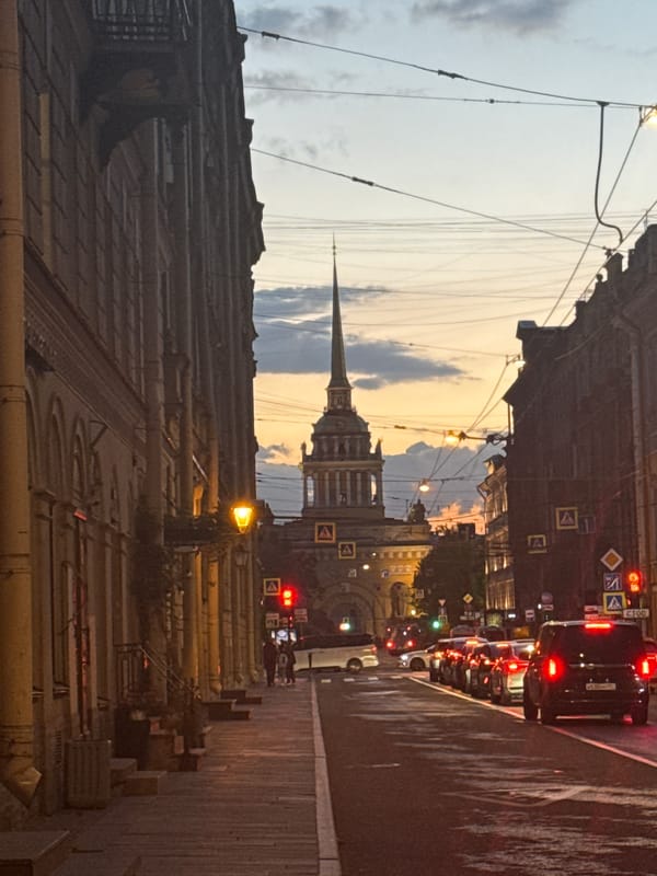 Tourist captures Saint Petersburg landmarks during evening hours