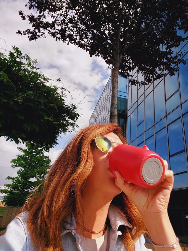 Morning selfie session outside a glass office building in Sofia