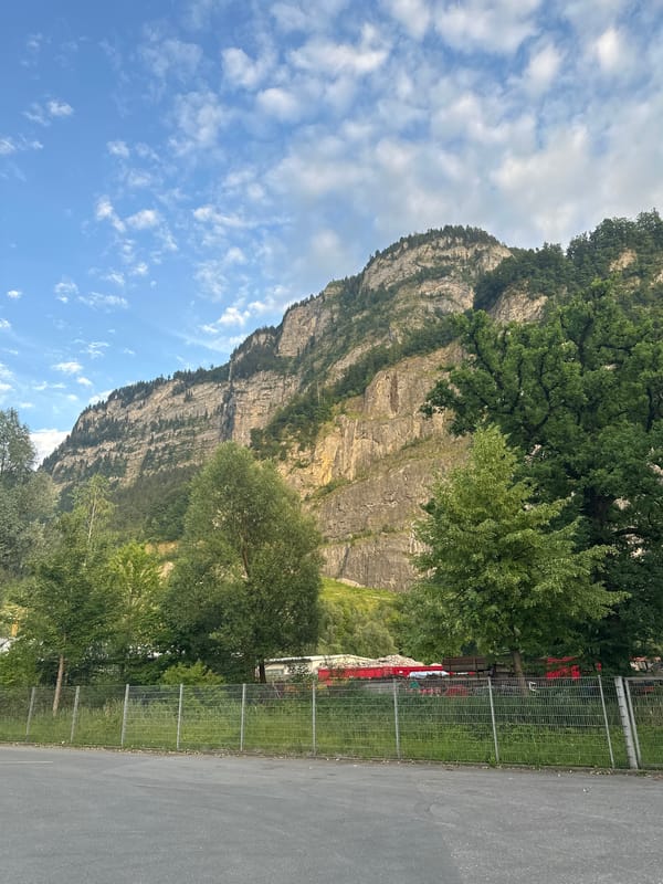 Industrial yard meets alpine scenery in Dornbirn, Austria