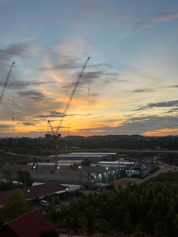 Construction cranes spotted during twilight in Pattaya City