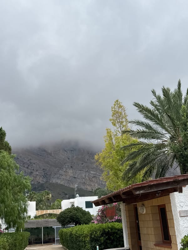 Beach fitness class and resort scenes on a cloudy Sicilian morning
