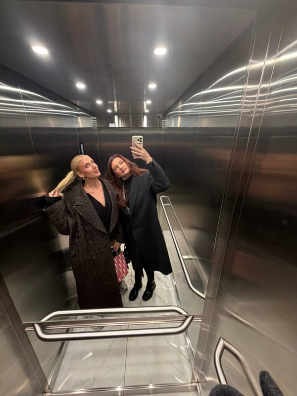 Women Take Mirror Selfies in Belgrade Elevator