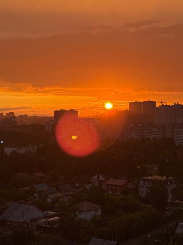 Golden hour sunset over Izhevsk, rainbow included