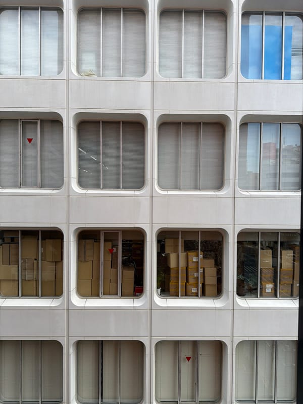 Late-night window observation captured in Tokyo's Chuo district