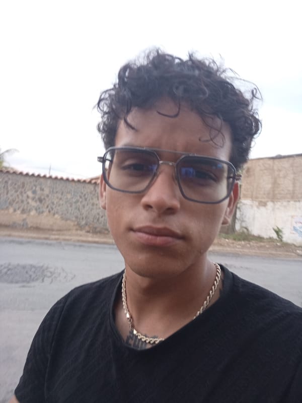 Young man documents evening scenes in Juan Griego, Venezuela