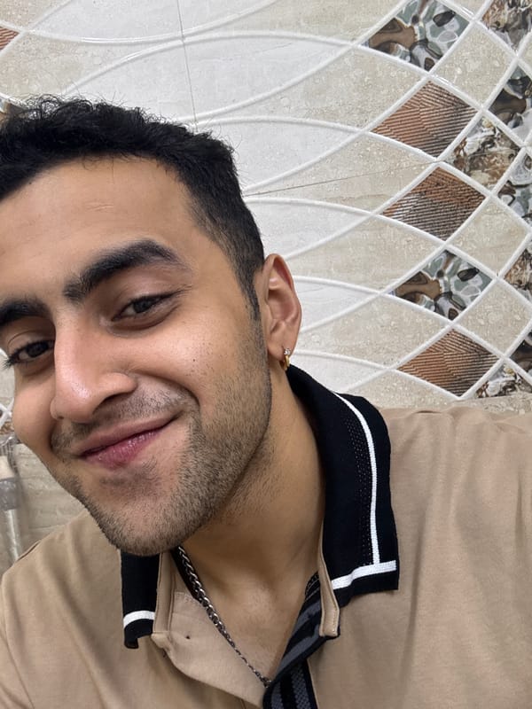 Portrait of bearded man in light brown shirt captured in Kolkata