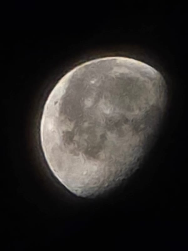 Crescent moon close-up over Naberezhnye Chelny night sky
