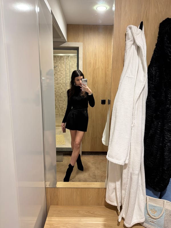 Woman takes bathroom mirror selfie in Pavel Banya, Bulgaria