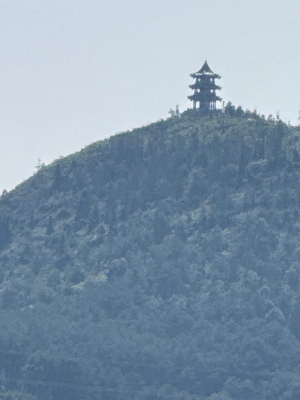 Morning architecture documentation in Jiangjin shows traditional and modern buildings