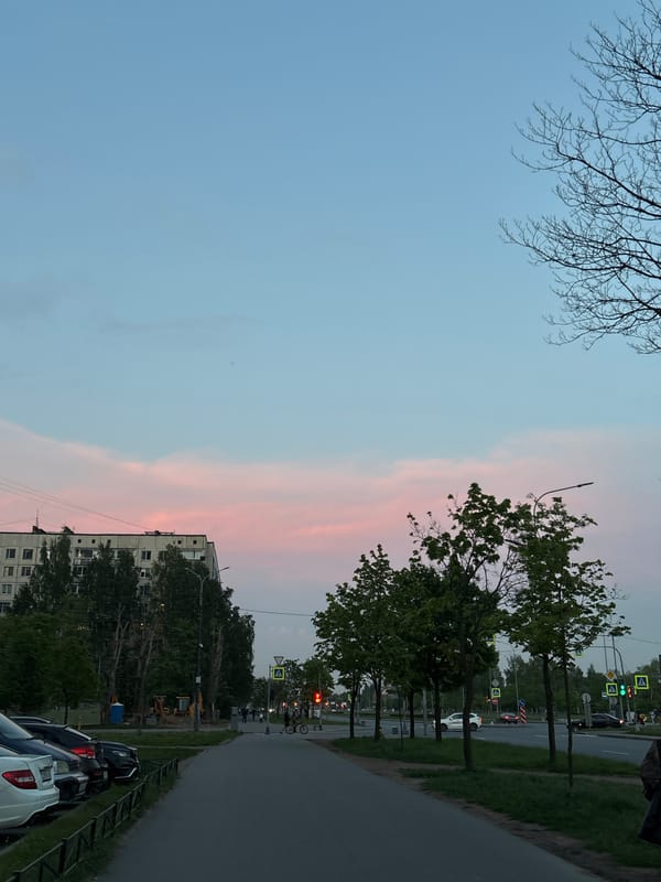 Evening street life captured in Vsevolozhsk during spring twilight
