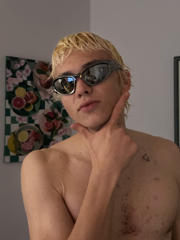 Blonde individual photographed posing shirtless in Novi Sad