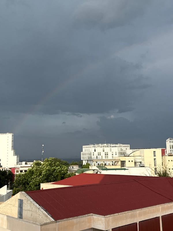 Faint rainbow over Nha Trang on a cloudy morning