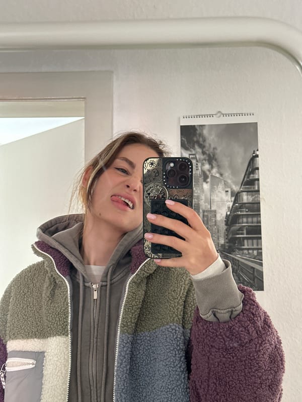 Young woman takes morning selfies in Kiel elevator