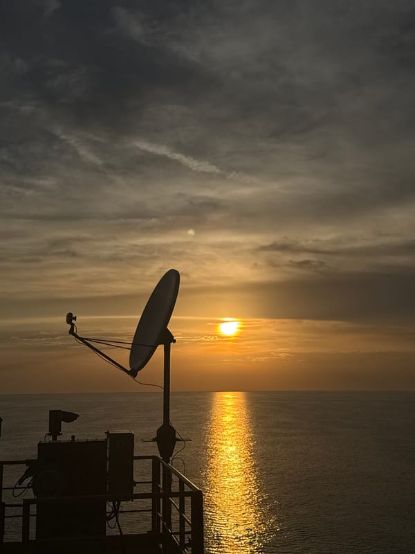 Offshore platform operations at sunset, Adriatic Sea