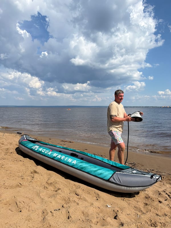 Family enjoys beach day with kayaking in Noviy, Russia