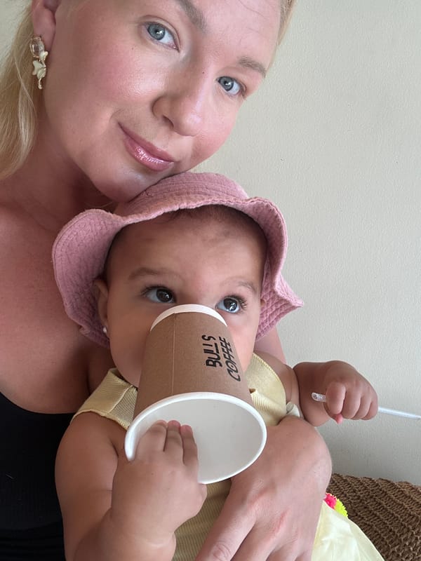 Mother and baby enjoy garden time in North Kuta