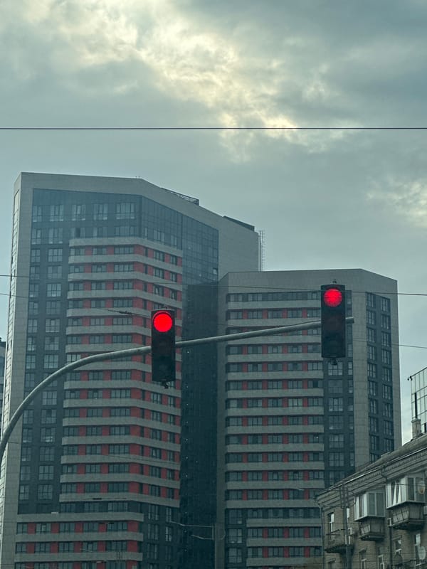 Everyday street scenes documented across Kyiv during afternoon traffic