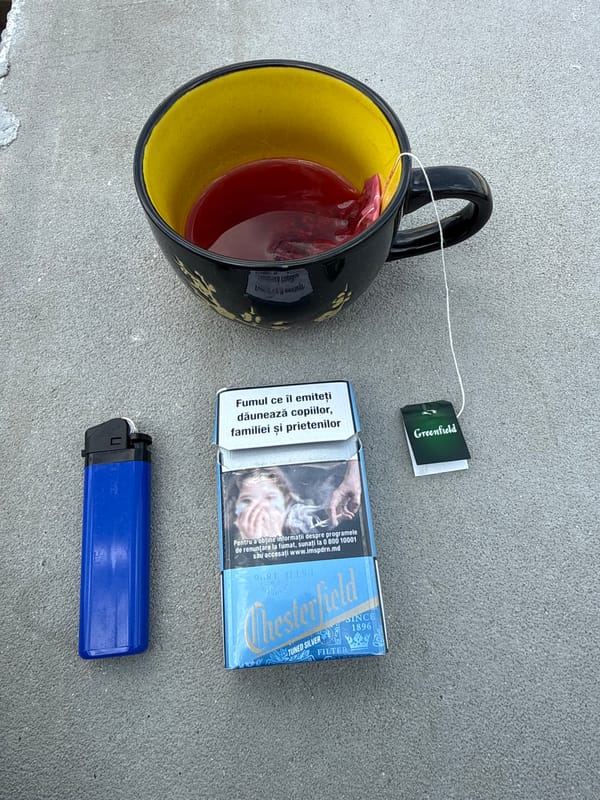Tea, maps, a metal shelter, and an industrial skyline