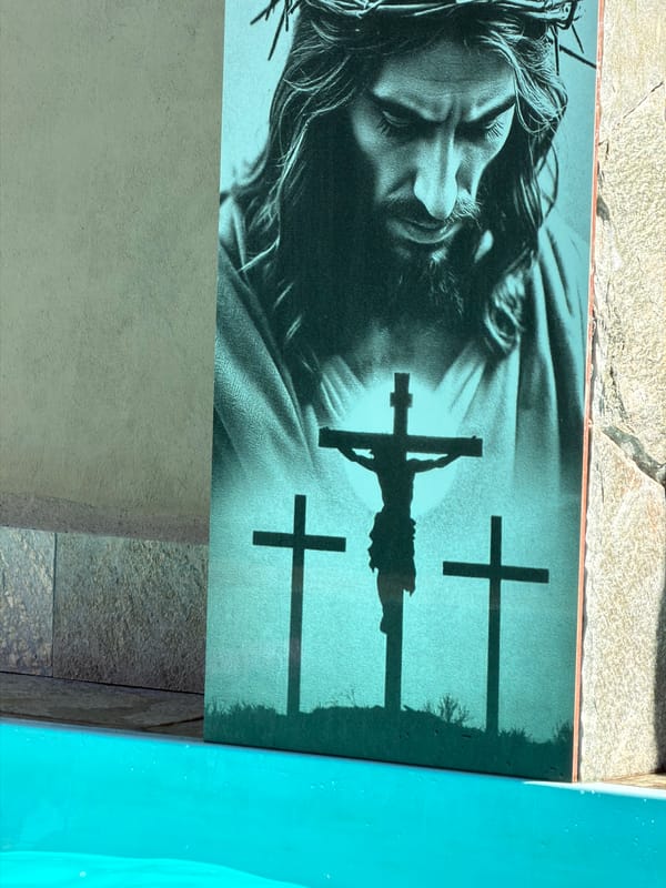 Religious artwork observed near pool facilities in Pirenópolis, Brazil