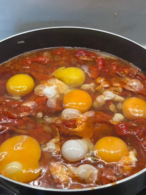 Eggs poaching in tomato and roasted pepper sauce, Pazardzhik
