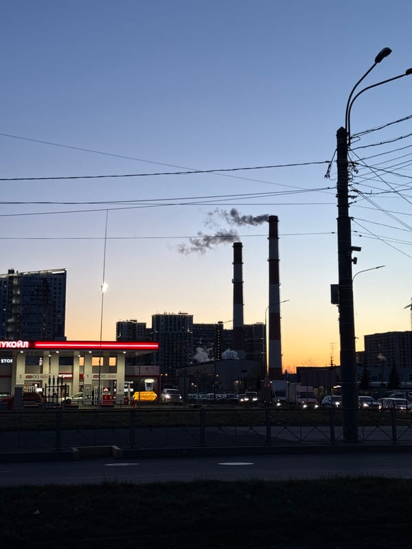 Evening street scene documented near Saint Petersburg gas station