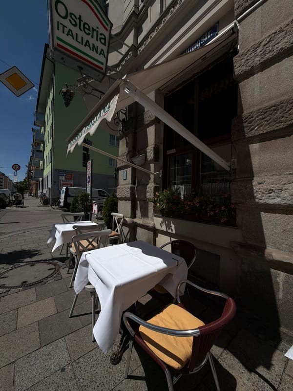 Street-level details around an Italian restaurant in Munich