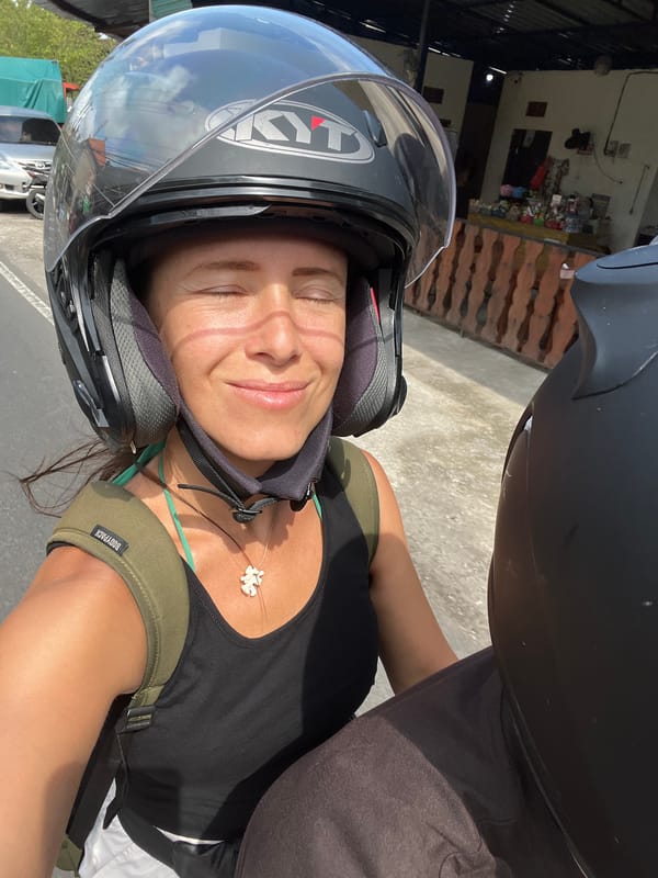 Morning scenes captured in Singakerta: motorcycle rider, stone craft shop
