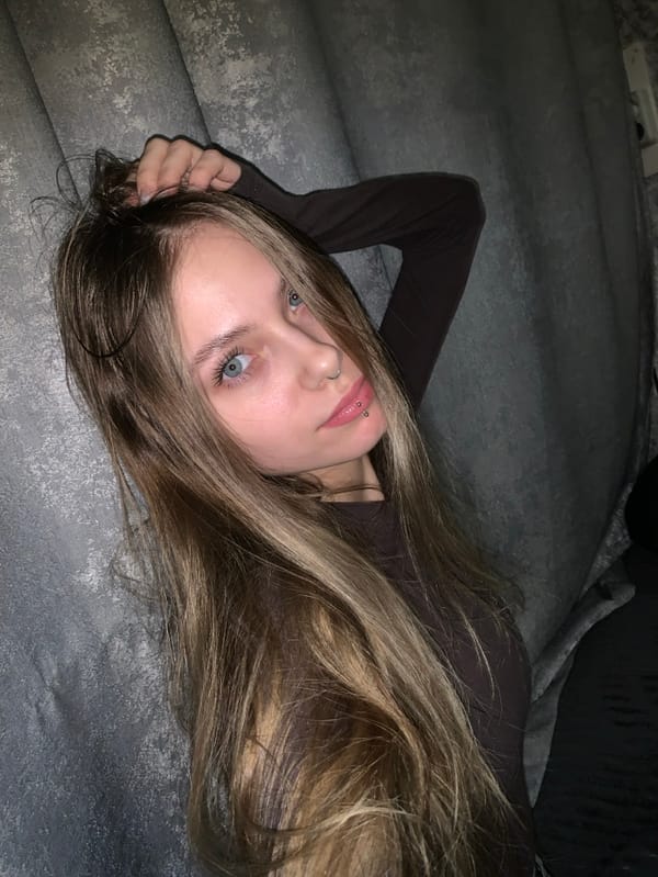 Young women photographed in casual indoor portraits in Foki, Russia