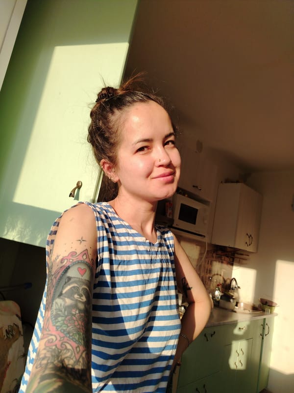 Woman photographed in striped top in Noviy, Russia