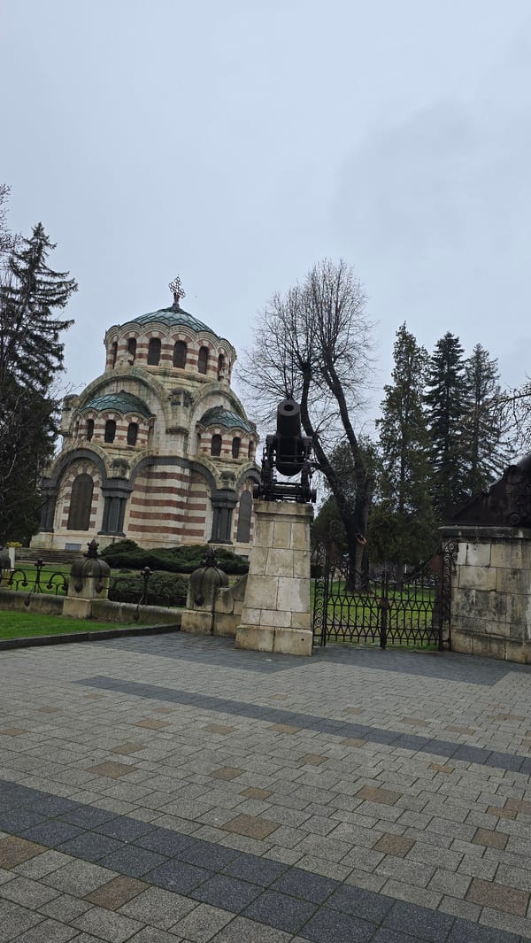 Tourist documents historical sites and spring scenery in Pleven, Bulgaria