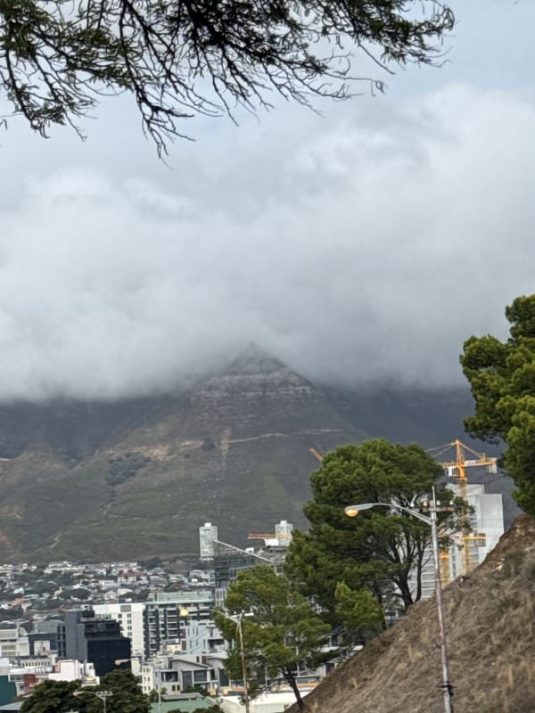 Cape Town's Table Mountain shrouded in clouds during overcast day