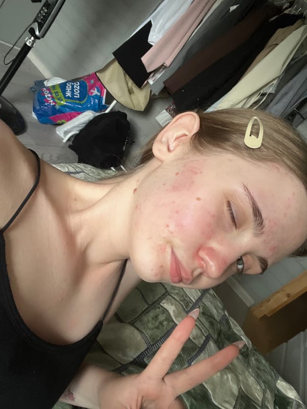 Lazy morning selfies in a wood-paneled bedroom, Ashkadar