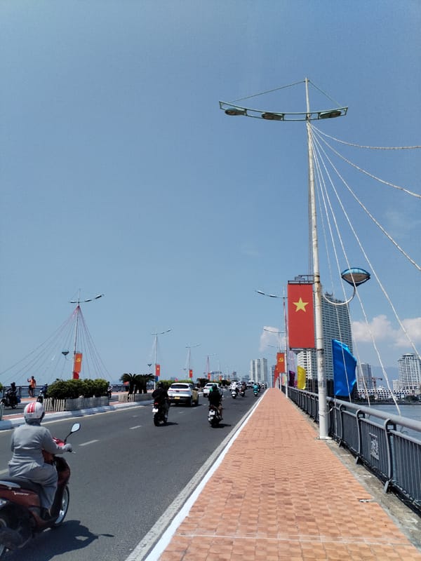 Flag-decorated bridge documented in early morning Nha Trang
